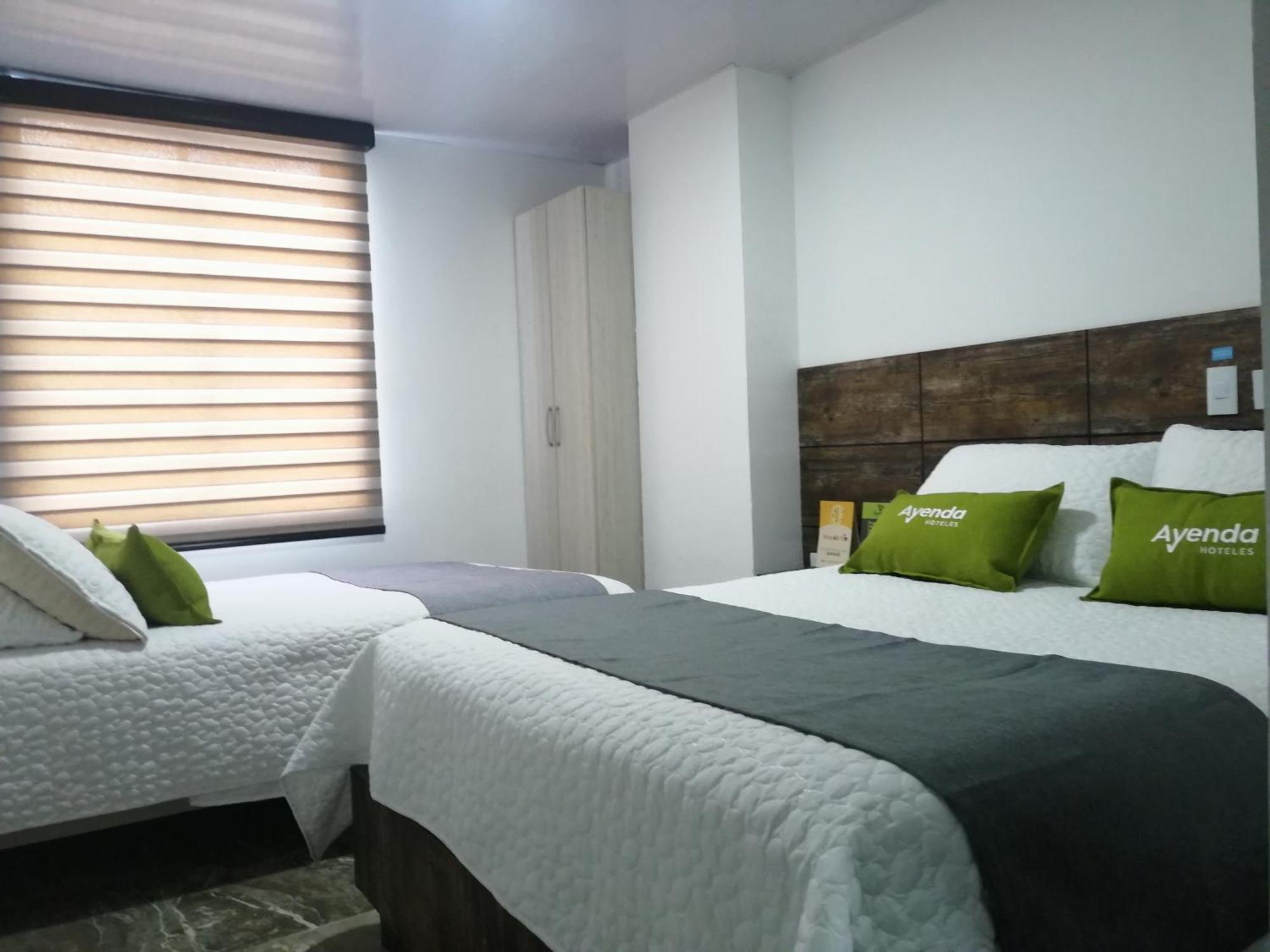 Hotel Los Maderos Кали Екстериор снимка